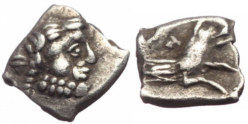 Lykaonia, Laranda AR Obol (Silver, 0.51g, 8mm) ca 324/3 BC. 
Obv: Head of Herakl...