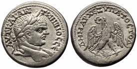 Phoenicia, Berytus AR Tetradrachm (Bronze, 12.31g, 26mm) Caracalla (198-217) ca 215-217
Obv: ΑVΤ • ΚΑΙ • ΑΝ-ΤWΝΙΝΟC CЄ, laureate head right 
Rev: ΔΗ...