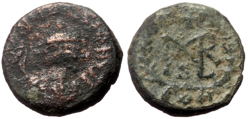 Marcian (450-457) AE Nummus (Bronze, 11mm, 0.99g) Constantinople. 
Obv: Diademed...