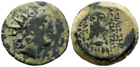 REINO SELEUCIDA, Cleopatra Thea y Seleucos VII. Ae18. (Ae. 5,49g/18mm). 125-121 a.C. Antioquía. (SNG Spaer 2441-2460). Anv: Cabeza radiada de Antiocos...