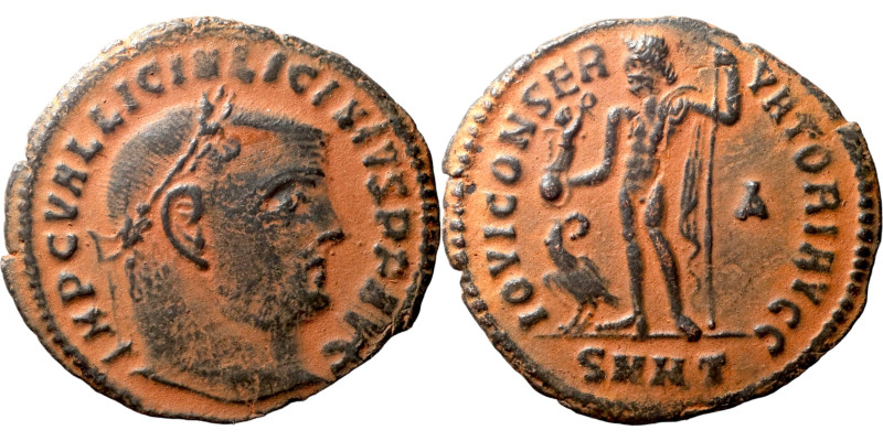 Licinius I. (321-323 AD). Follis. Obv: IMP C VAL LICIN LICINIVS P F AVG. laureat...