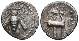 ARADOS. Phoenicia. 2nd Century B.C.
Drachm, Year 100 (160/159 B.C.). Bee, P to l., ΔI to r. Rv. Stag standing r., palm tree in background., APAΔIΩN t...