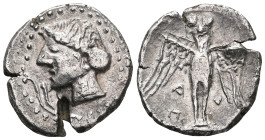 Greek Pontos. Amisos circa 300-125 BC.Siglos ARTurreted head of Tyche-Hera rleftRev: Owl, with wings spread, standing facing on shield; monogram to in...