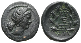GreekMYSIA. Kyzikos (Circa 200-100 BC).AE Bronze Head of Kore right, wearing wreath of corn / KY-ZI above and beneath monogram, monogram below, all wi...