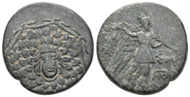 Greek Coin PONTUS, Amisos . Circa 85-65 BC. Æ….Aegis / AMI-SOU, Nike walking right, holding palm tied with fillet over left shoulder; monograms left a...