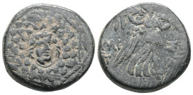 Greek Coin PONTUS, Amisos . Circa 85-65 BC. Æ….Aegis / AMI-SOU, Nike walking right, holding palm tied with fillet over left shoulder; monograms left a...