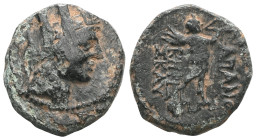 Phrygia, Apameia, c. 88-40 BC. Æ . Philokrat-, Ariste-, magistrates. Turreted bust of Artemis–Tyche r., bow and quiver over shoulder. R/ Marsyas advan...