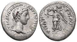 CAPPADOCIA, Caesaraea. Commodus, 177-192. Didrachm. ΑΥΤ Μ ΑΥΡ ΚΟΜΟ ΑΝΤWNINOC CE Laureate head of Commodus to right. Rev. YΠATOC Γ ΠAT ΠATPI Nike flyin...