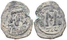 ByzantineConstans II, Constantine IV, Heraclius, and Tiberius, AE, Follis, (Bronze,.) Constantinople. 641-668 AD.Obv: Constans bust facing with long b...
