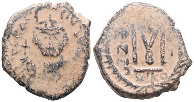 Heraclius AE follis (Bronze) Nicomedia
Obv: Helmeted, draped, cuirassed bust fa...