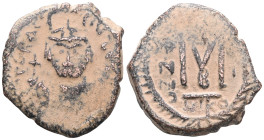 Heraclius AE follis (Bronze) Nicomedia
Obv: Helmeted, draped, cuirassed bust facing, holding cross
Rev: Large M, ANNO to left, cross above, regnal y...