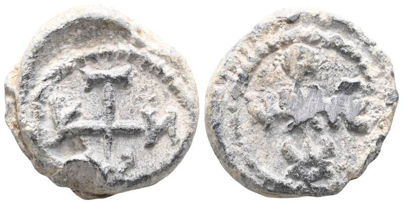 Byzantine Lead Seals, 7th - 13th Centuries
Obverse: Monogram with cross. Letter...