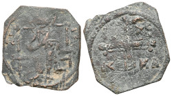 Uncertain Byzantine Follis, overstruck with Islamic fals (bronze). Christ bust facing, cruciger in both hands. Overstruck with unknown Islamic legend....