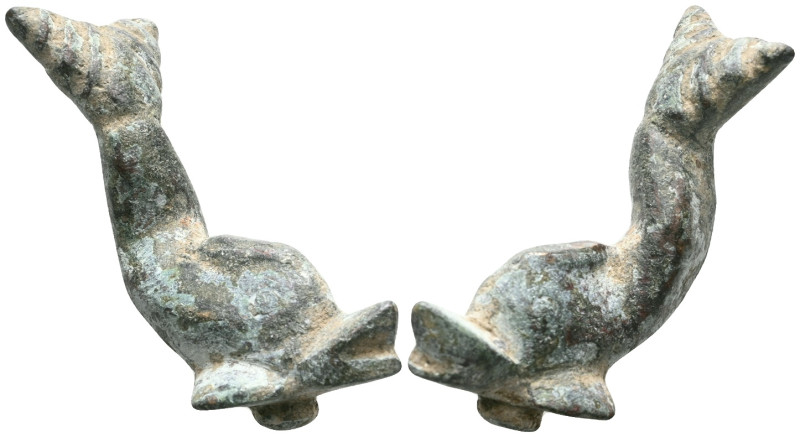 ANCIENT ROMAN BRONZE DOLPHIN FIGURINE.(1st - 2nd Century).Ae

Weight: 36,8 gr...