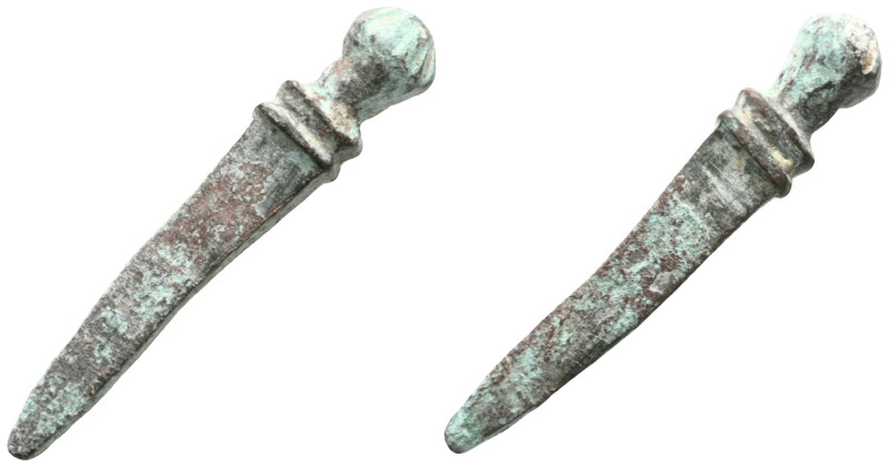ANCIENT ROMAN BRONZE SWORD PENDANT.(Circa 1st - 2nd century).Ae.

Weight: 5,2 ...
