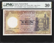 EGYPT. National Bank of Egypt. 10 Pounds, 1945. P-23b. Repeater Serial Number. PMG Very Fine 30.
Serial number X/86 009009. Dated January 16th, 1945....