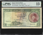EGYPT. National Bank of Egypt. 50 Egyptian Pounds, 1951. P-26b. PMG Choice Fine 15.
PMG Comments "Annotations."

Estimate: $300.00- $500.00