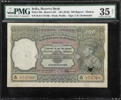 INDIA. Reserve Bank of India. 100 Rupees, ND (1943). P-20o. PMG Choice Very Fine 35 Net. Staple Holes at Issue, Repaired, Pinholes, Ink.
Madras. PMG ...