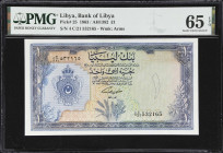 LIBYA. Bank of Libya. 1 Libyan Pound, 1963. P-25. PMG Gem Uncirculated 65 EPQ.
Lovely gem example with multicolored obverse, coat of arms at left and...