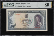 RHODESIA. Reserve Bank of Rhodesia. 5 Pounds, 1966. P-29a. PMG Very Fine 30.
The obverse shows QEII at right with C. Rhodes watermark at left and a c...