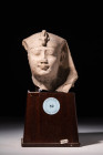GYPSUM PLASTER HEAD OF A PHARAOH

 Ca. 332 - 200 BC A striking, youthful male head of a Pharaoh, moulded in plaster and carved. The idealistic face ...