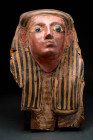EGYPTIAN WOODEN SARCOPHAGUS PANEL WITH MASK

 Third Intermediate Period, 21st Dynasty, Ca. 1025 - 944 BC A large and finely carved Egyptian wooden s...