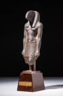 EGYPTIAN BASALT STATUE OF THOTH

 Late Period, Ca. 664 - 332 BC A magnificent basalt stone statuette portraying the deity Thoth. He is characterised...
