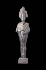 EGYPTIAN GOLD INLAID BRONZE STATUETTE OF OSIRIS

 Late Period, Ca. 664 - 332 BC An Egyptian gold inlaid bronze figurine of Osiris, god of the underw...