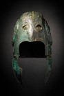 GREEK CHALCIDIAN HELMET WITH HORNS OF ZEUS AMUN

 Ca. 500 - 400 BC A rare Chalcidian bronze helmet with angular ribs hammered outwards on each side....