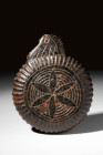 EGYPTIAN OR PHOENICIAN STONE SHALLOW BOWL WITH ROSETTE

 Ca. 600 - 300 BC A heavy stone dish with low, straight walls. One side bears a flat, roughl...