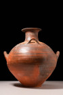 GREEK PROTO GEOMETRIC HYDRIA

 Ca. 600 - 400 BC A Greek proto-geometric pottery hydria with an elongated form and three applied loop handles. The co...