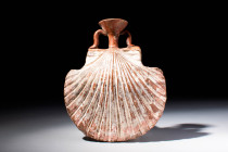 GREEK TERRACOTTA SHELL-SHAPED FLASK

 Ca. 400 - 200 BC A Greek terracotta flask composed of a highly detailed double-valve shell-shaped body with de...