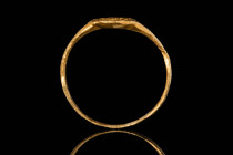PUNIC OR HELLENISTIC GOLD RING DEPICTING A PROFILE OF MAN

 Ca. 300 - 100 BC A Punic or Hellenistic gold ring with a circular bezel, depicting a pro...
