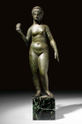 ROMAN BRONZE STATUETTE OF STANDING VENUS 

 Ca. AD 100 - 200 A magnificent bronze statue of Venus, the Roman goddess of love and beauty. Venus is de...