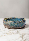 ROMAN PALE BLUE GLASS PYXIS

 Ca. AD 100 - 300 A Roman mould-blown pale blue glass pyxis exhibiting a cylindrical form with a slightly concave base....