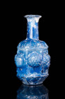 ROMAN BLUE GLASS HEXAGONAL UNGUENTARIUM

 Ca. 100 BC - AD 100 A lovely Roman free-blown, semi-translucent glass unguentarium with a vibrant blue hue...