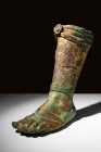 ROMAN LIFE-SIZE BRONZE FOOT FROM A STATUE

 Ca. AD 100 - 300 A Roman cast-bronze foot created using the lost wax (cire perdue) technique. This left ...