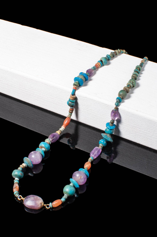 EGYPTIAN FAIENCE NECKLACE WITH RARE AMETHYST BEADS

 Ca. 1550 - 1070 BC An Egy...