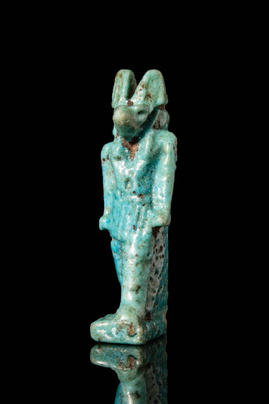 EGYPTIAN FAIENCE AMULET OF ANUBIS

 Ca. 664 - 30 BC A mould-formed green faien...