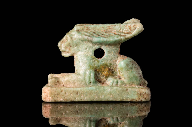 EGYPTIAN PALE FAIENCE HARE AMULET 

 Ca. 664 - 332 BC A mould-formed pale gree...