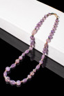 HELLENISTIC AMETHYST NECKLACE

 Ca. 300 - 100 BC A Hellenistic necklace with amethyst beads, alternating with seed shaped faience beads. Restrung.
...