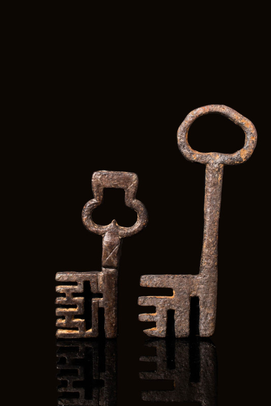 SET OF TWO MEDIEVAL KEYS

 Ca. AD 1300 - 1500 A pair of medieval iron keys, th...