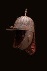 OTTOMAN GILDED IRON CAVALRY HELMET

 Ca. AD 1600 - 1700 An Ottoman zischägge composed of a brim, cheek protection, and rear ‘lobster-tail’ neck prot...