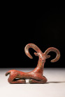 AMLASH RECUMBENT STAG WITH LONG CURVED HORNS

 Ca. 1200 - 800 BC A beautiful figurine of a recumbent stag represented with body in profile while the...
