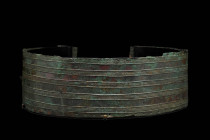 URARTIAN BRONZE BELT

 Ca. 1200 - 1000 BC An incredibly rare complete Urartian belt. This example is made from hammered bronze and decorated in low ...