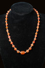 BACTRIAN CARNELIAN BEADED NECKLACE

 Ca. 3000 - 2000 BC A beautiful Bactrian necklace made of carnelian beads alternating with seed-shaped faience b...