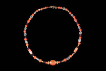 BACTRIAN NECKLACE WITH CENTRAL BEAD

 Ca. 3000 - 2000 BC A Bactrian necklace composed of carnelian, quartz and ruby beads in different forms and col...