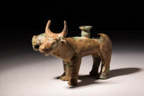 NEAR EAST BRONZE STAND COMPOSITE LION AND BULL

Ca. 1500 - 1000 BC A very rare Near Eastern cast-bronze stand in the shape of a composite Lion and B...