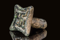 BACTRIAN BRONZE STAMP SEAL WITH SWASTIKA

 Ca. 3000 - 1500 BC A Bactrian stamp seal cast from bronze into a star shape with swastika. The swastika i...