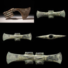 WESTERN ASIATIC BRONZE BATTLE AXE WITH OPEN MOUTH LION

 Ca. 1200 - 900 BC A Western Asiatic bronze axe-head with an imposing vertical blade edge ex...